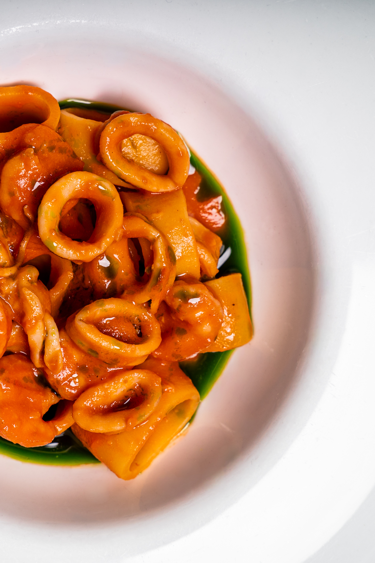 Calamarata al sugo di mare — fotografo food Brescia